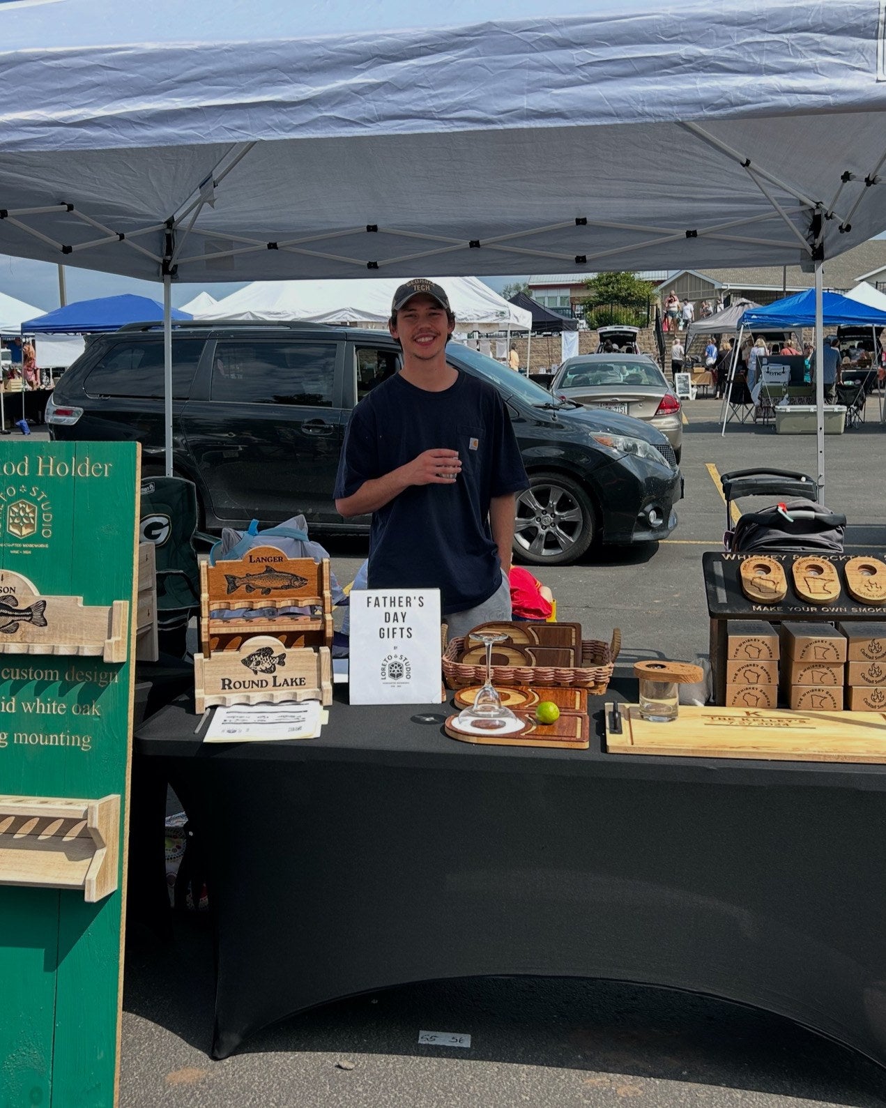 Colton Langer at the Loreto Studio farmers market booth