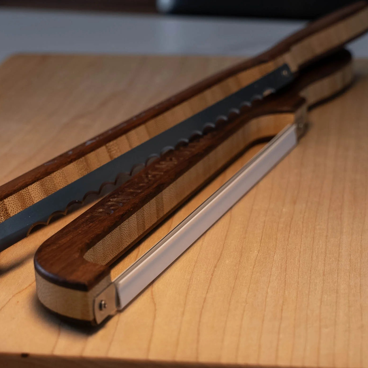 What's included with your Loreto Studio bread knife order: the knife and a protective blade guard.